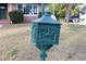 Close-up of an ornate green mailbox with horse detail at 36847 Jefferson Ave, Dade City, FL 33523