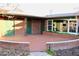 Hexagonal tile patio with brick border and access to the home at 36847 Jefferson Ave, Dade City, FL 33523