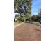 Brick paved street with trees and homes along the sides at 36847 Jefferson Ave, Dade City, FL 33523