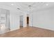 Bright bedroom with a ceiling fan and access to walk-in closets at 4407 W Dale Ave, Tampa, FL 33609