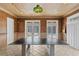 Inviting game room with a ping pong table, offering easy access to the outdoor pool and entertainment area at 4407 W Dale Ave, Tampa, FL 33609