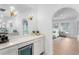 Hallway with bar and a view of the main bedroom at 4407 W Dale Ave, Tampa, FL 33609