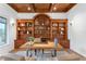 Elegant office featuring custom built-ins, hardwood floors and coffered ceiling at 4407 W Dale Ave, Tampa, FL 33609