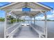 Community dock, residents only; features a covered seating area at 4823 Ebbtide Ln # 403, Port Richey, FL 34668