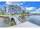 Private dock with walkway, offering serene waterfront access at 4823 Ebbtide Ln # 403, Port Richey, FL 34668