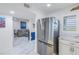 Modern kitchen with stainless steel appliances and marble countertops at 4823 Ebbtide Ln # 403, Port Richey, FL 34668