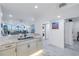 Modern kitchen with marble countertops and stainless steel appliances at 4823 Ebbtide Ln # 403, Port Richey, FL 34668