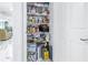 Well-organized pantry with ample shelving for food storage at 4823 Ebbtide Ln # 403, Port Richey, FL 34668