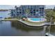 Community pool, offering resort-style living by the water at 4823 Ebbtide Ln # 403, Port Richey, FL 34668
