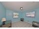 Light blue bedroom with two nightstands at 6025 Florida S Cir, Apollo Beach, FL 33572