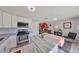 Modern kitchen with stainless steel appliances and granite countertop at 6025 Florida S Cir, Apollo Beach, FL 33572