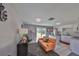 Modern kitchen with white cabinets, granite countertops, and island at 6025 Florida S Cir, Apollo Beach, FL 33572