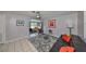 Open living room with gray walls and access to the kitchen at 6025 Florida S Cir, Apollo Beach, FL 33572