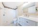 Updated bathroom with walk-in shower and new fixtures at 6145 Sun Blvd # 103, St Petersburg, FL 33715