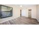 Bedroom with water view and access to bathroom at 6145 Sun Blvd # 103, St Petersburg, FL 33715