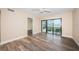 Bedroom with water view and sliding door to balcony at 6145 Sun Blvd # 103, St Petersburg, FL 33715