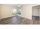 Bright bedroom with water views and wood-look floors at 6145 Sun Blvd # 103, St Petersburg, FL 33715