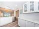 Modern kitchen with white cabinets and stainless steel appliances at 6145 Sun Blvd # 103, St Petersburg, FL 33715