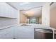 Updated kitchen with a breakfast bar and water views at 6145 Sun Blvd # 103, St Petersburg, FL 33715