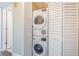 Stackable washer and dryer in a well-lit laundry closet at 6145 Sun Blvd # 103, St Petersburg, FL 33715