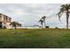 Community pool area with lush landscaping at 6145 Sun Blvd # 103, St Petersburg, FL 33715