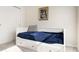 Small bedroom with trundle bed and window at 711 Old Windsor Way, Spring Hill, FL 34609