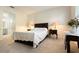 Bedroom with a queen-size bed and access to a full bathroom at 711 Old Windsor Way, Spring Hill, FL 34609