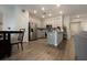 Modern kitchen with stainless steel appliances and granite countertops at 711 Old Windsor Way, Spring Hill, FL 34609