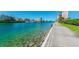 Scenic waterfront path with clear water views at 7425 Bay Island S Dr # 104, South Pasadena, FL 33707