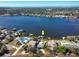 Aerial view of waterfront home and neighborhood at 743 Chesapeake Dr, Tarpon Springs, FL 34689