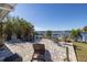 Waterfront patio with seating area and water views at 743 Chesapeake Dr, Tarpon Springs, FL 34689