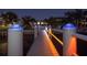Lighted walkway to private boat dock at night at 743 Chesapeake Dr, Tarpon Springs, FL 34689