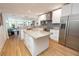 Updated kitchen with large island and stainless steel appliances at 743 Chesapeake Dr, Tarpon Springs, FL 34689
