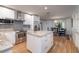 Modern kitchen with island, stainless steel appliances, and granite countertops at 743 Chesapeake Dr, Tarpon Springs, FL 34689