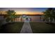 Stunning sunset view over the water from the backyard at 743 Chesapeake Dr, Tarpon Springs, FL 34689