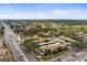 Aerial view of community with pool and parking at 7606 Woodbridge Blvd, Tampa, FL 33615