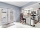 Modern kitchen with granite countertops and stainless steel appliances at 7606 Woodbridge Blvd, Tampa, FL 33615