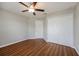 Bedroom with double door closet and ceiling fan at 7849 Grafton Rd, North Port, FL 34291
