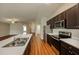 Eat-in kitchen with stainless steel appliances and an island at 7849 Grafton Rd, North Port, FL 34291
