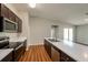 Modern kitchen with stainless steel appliances and dark cabinetry at 7849 Grafton Rd, North Port, FL 34291