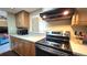 Kitchen boasts stainless steel appliances and light wood cabinets at 833 N Keene Rd # W12, Clearwater, FL 33755