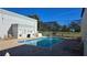 Community pool with lounge chairs for relaxing and sunbathing at 833 N Keene Rd # W12, Clearwater, FL 33755