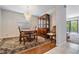 Bright dining room with hardwood floors, chandelier, and built-in hutch at 867 Mandalay Ave, Clearwater Beach, FL 33767