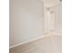 Well-lit bedroom with neutral walls and carpet at 11498 Boundless Ter, Venice, FL 34293