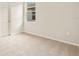 Bright bedroom featuring neutral walls and carpet at 11498 Boundless Ter, Venice, FL 34293