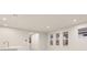 Bright living room with large windows and recessed lighting at 11498 Boundless Ter, Venice, FL 34293