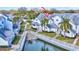 Aerial view of waterfront property showing building and canal at 12189 Armenia Gables Cir # 12189, Tampa, FL 33612