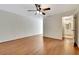 Spacious bedroom with hardwood floors and ceiling fan at 12189 Armenia Gables Cir # 12189, Tampa, FL 33612