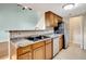 Kitchen with stainless steel appliances and wood cabinets at 12189 Armenia Gables Cir # 12189, Tampa, FL 33612
