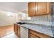 Kitchen with stainless steel appliances and wood cabinets at 12189 Armenia Gables Cir # 12189, Tampa, FL 33612